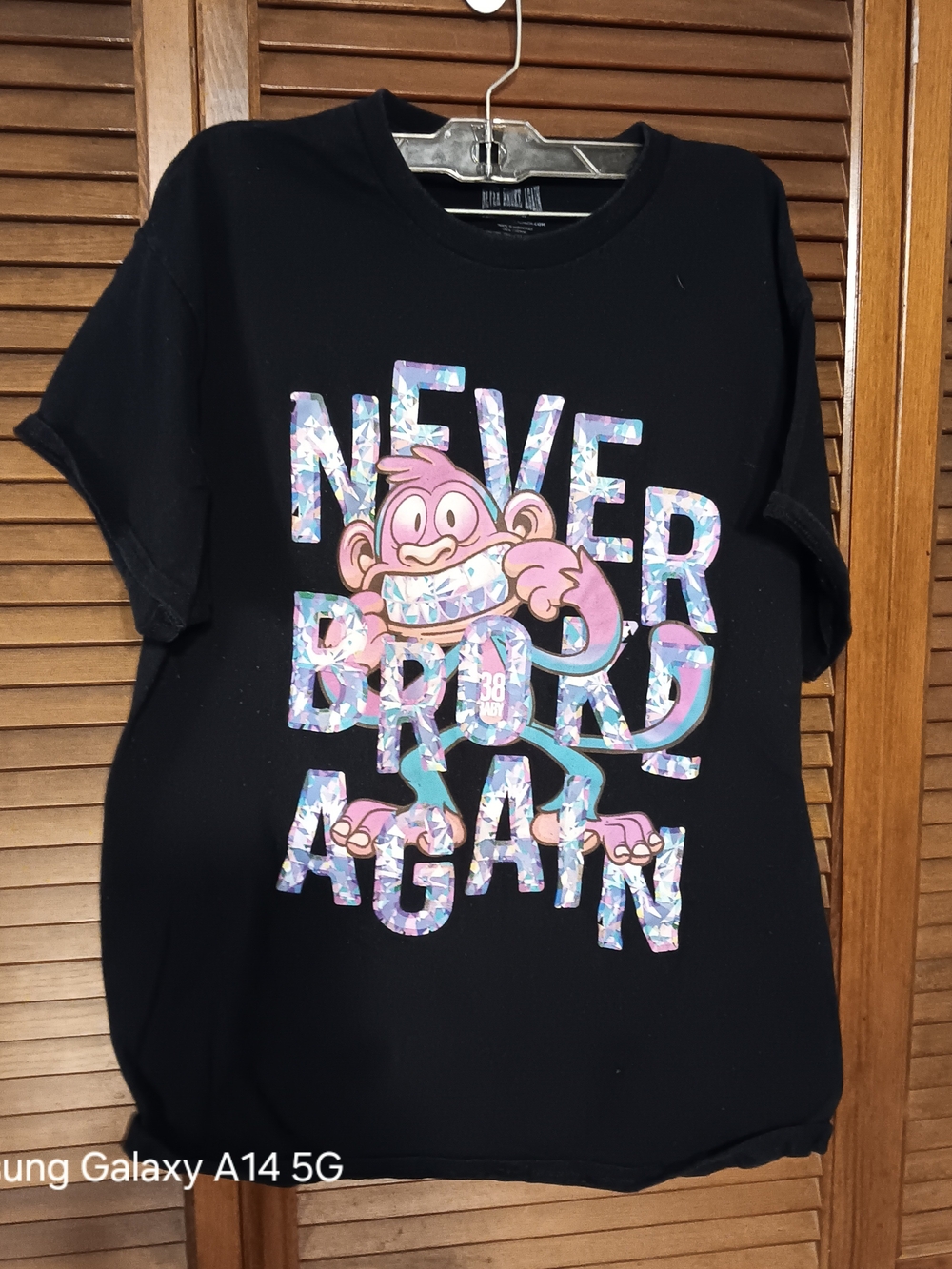 Black Graphic Tee - 'Never Broke Again' Cartoon Print
